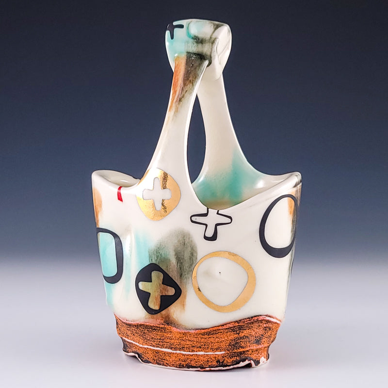 Ceramic vessel photographed in studio lighting